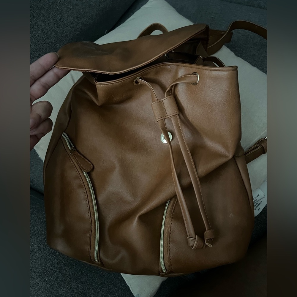 ULTA medium large faux leather drawstring backpack with gold accent. NEW